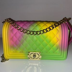 Multi-colored purse with pink & gold strap